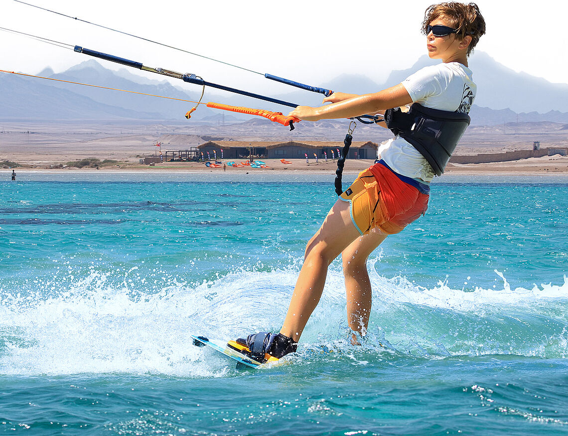 Kitesurfing kids at KBC El Gouna on the Red Sea in Egypt, Kids Kitesurfer, Grommet water sports action