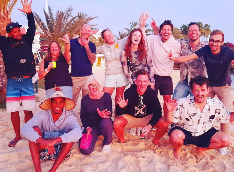 Kitesurf Event group photo on beach at Kiteboarding Club KBC Sal Surf Hub, Cape Verde - water sports community celebration