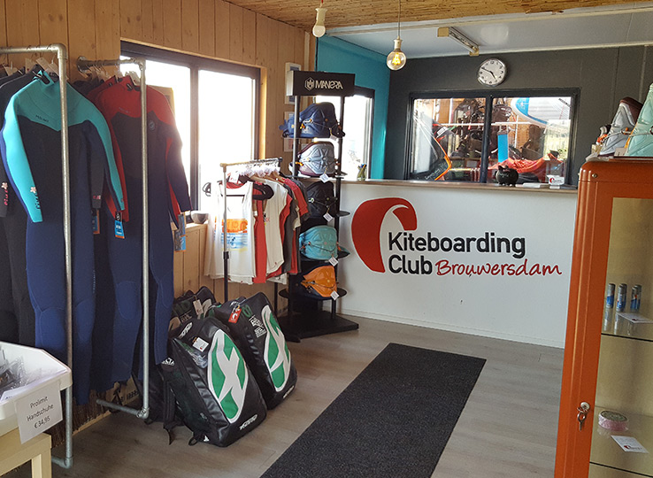 Kiteboarding Club Brouwersdam interior with kite equipment, wetsuits and kitesurfing gear rental shop