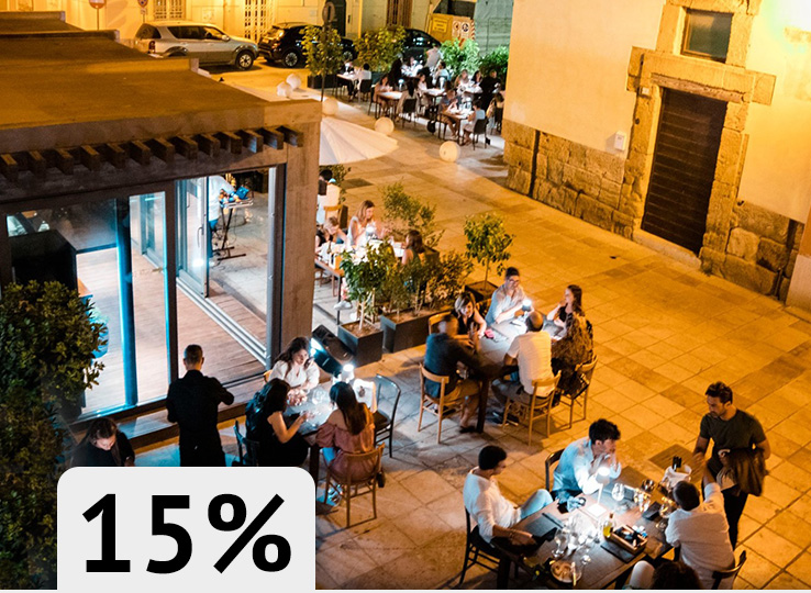 Evening atmosphere at Mediterranean restaurant terrace - perfect dining spot for kiteboarders after water sports